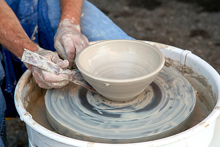 person makin pottery thumbnail
