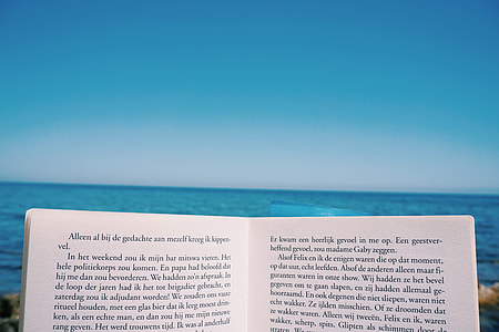 open book with blue sea background thumbnail