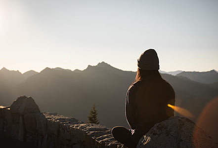 person sitting on concrete thumbnail