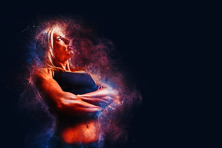woman wearing black crop top looking upward thumbnail