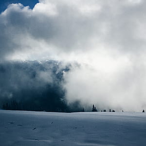 snowy mountain under white clouds thumbnail
