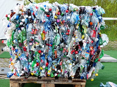 assorted plastic bottle lot on brown wooden pallet thumbnail