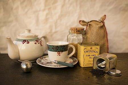 white and green ceramic teacup on saucer thumbnail