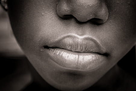 grayscale photo of person's lips thumbnail