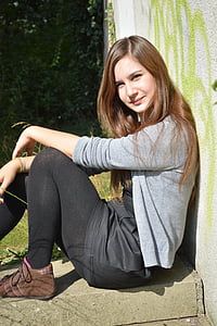 woman in grey cardigan and black pants outfit thumbnail