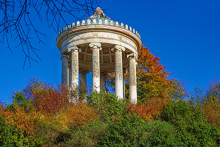 gray gazebo surrounded with trees thumbnail