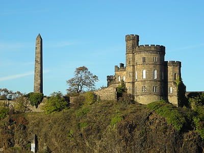 grey castle building with tower during daytime thumbnail