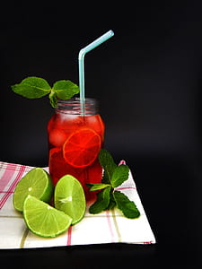 fruit juice in jar with stray thumbnail