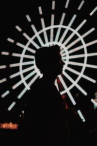 silhouette of man with reel light background thumbnail