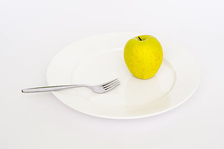 white ceramic plate with silver fork thumbnail
