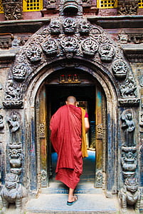 monk walking towards temple thumbnail