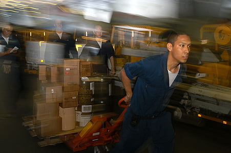 man wearing blue jumpsuit thumbnail