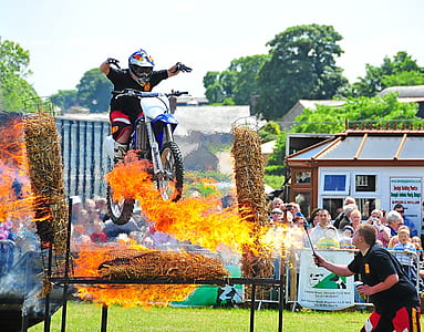 man riding on dirt bike thumbnail