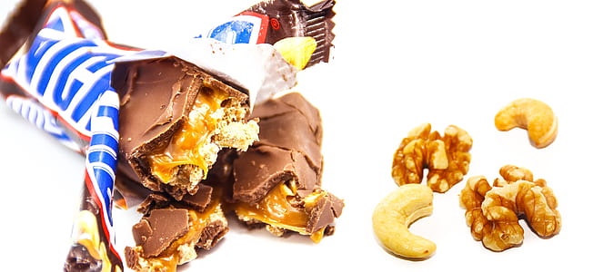 opened Snickers chocolate bar thumbnail
