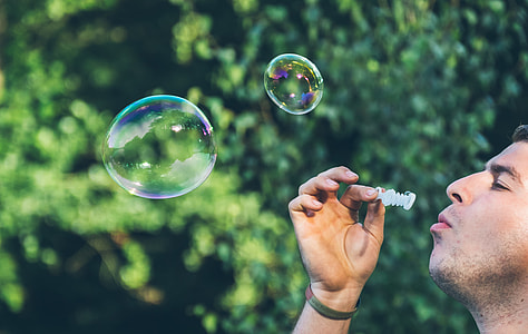 person blowing bubbles thumbnail