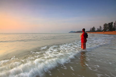 Person on the Seashore during Sun Set thumbnail
