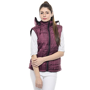 woman in maroon zip-up vest standing in white background thumbnail