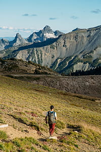 man wearing backpack thumbnail