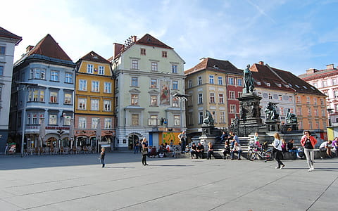 People Walking in Front of Buildings thumbnail