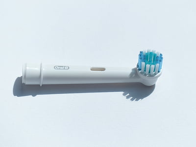 white Oral-B toothbrush thumbnail