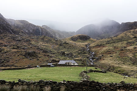 gray house near mountain thumbnail