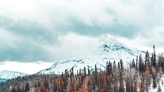 low angle photography of snow-covered mountain during daytime thumbnail