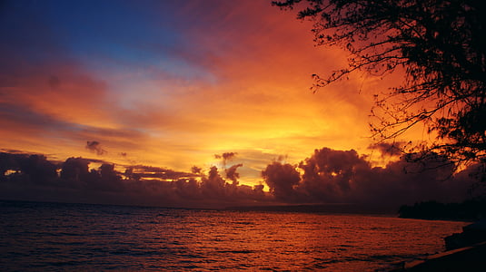 body of water during sunset thumbnail