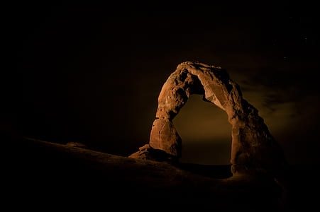 arch sculpture during nighttime thumbnail