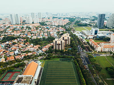 aerial photography of brown and white buildings thumbnail