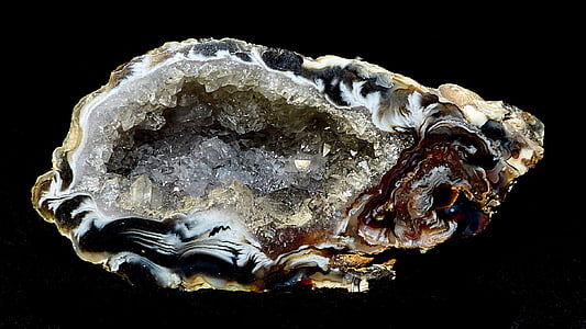 grey geode against black background thumbnail