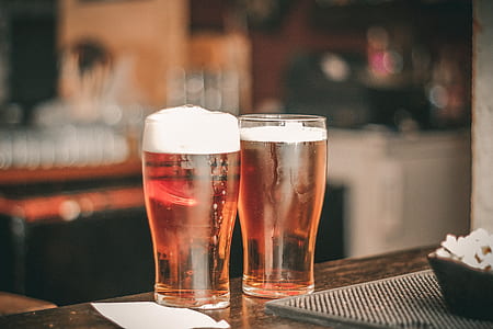 Depth of Field Photo of Two Pilsner Glasses thumbnail