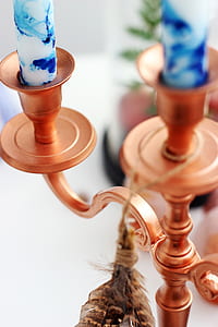 shallow focus photo of copper candle holder thumbnail
