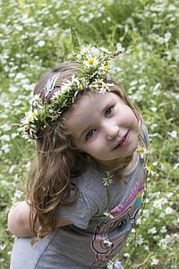 girl's wearing gray and pink My Little Pony-printed crew-neck t-shirt standing near green grass at daytime thumbnail