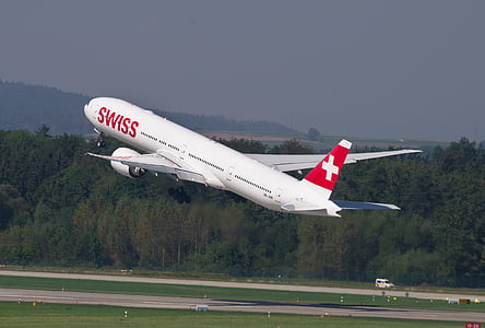 Swiss commercial Airplane departing at daytime thumbnail