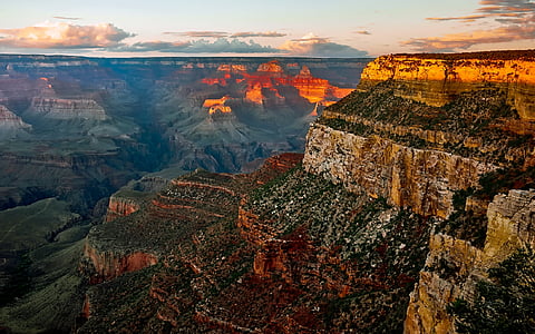 aerial view of grand canyon under cloudy sky thumbnail