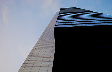 worm's eye view photography of glass high rise building thumbnail