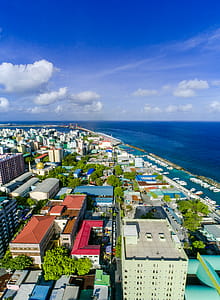Aerial Photography of City Near Body of Water thumbnail