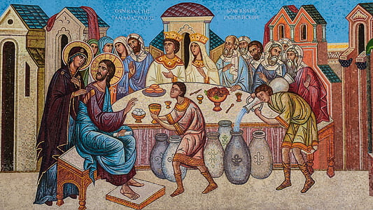 Jesus Christ sitting on brown chair near table thumbnail