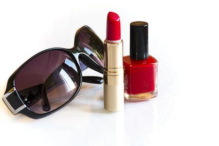 women's black sunglasses, red lipstick and red nail polish bottle thumbnail