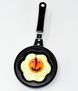 black frying pan on white background thumbnail