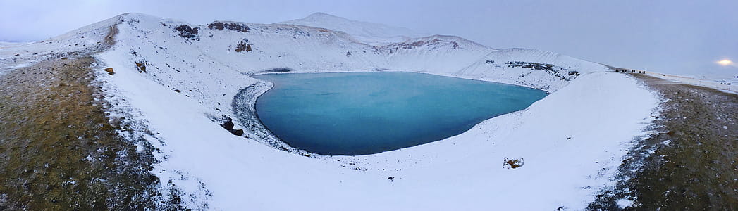 Blue Lake in the Middle of Snowfield thumbnail