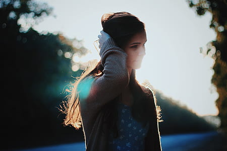 woman wearing gray cardigan thumbnail