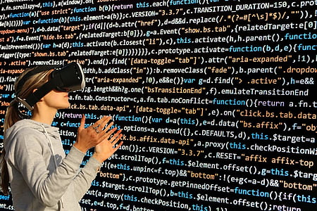woman wearing gray pullover hoodie and virtual reality headset thumbnail