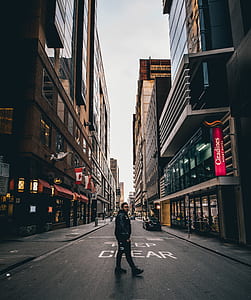 man in the middle of street thumbnail