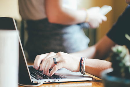 person typing on laptop thumbnail