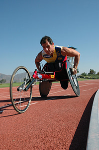 man riding on recumbent trike during daytime thumbnail