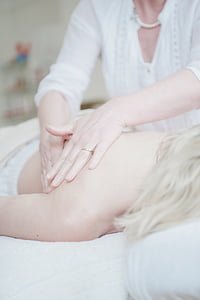 person laying on white bed thumbnail