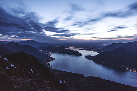 bird's eye photography of river near mountain thumbnail