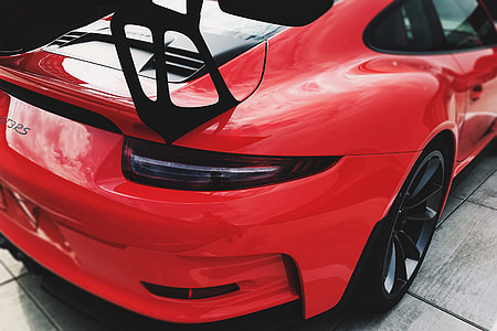 Red Porsche sports car thumbnail