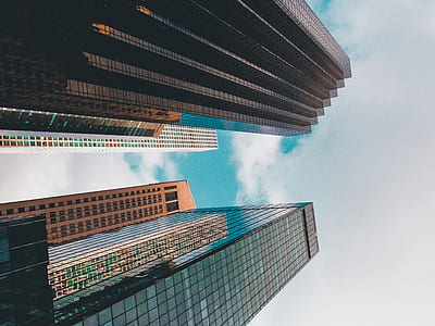 low-angle photography of two high-rise buildings thumbnail